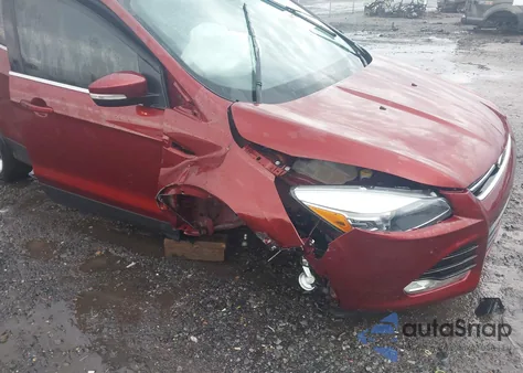 2016 Ford Escape Titanium z USA, uszkodzony, nr VIN 1FMCU0J94GUA20958